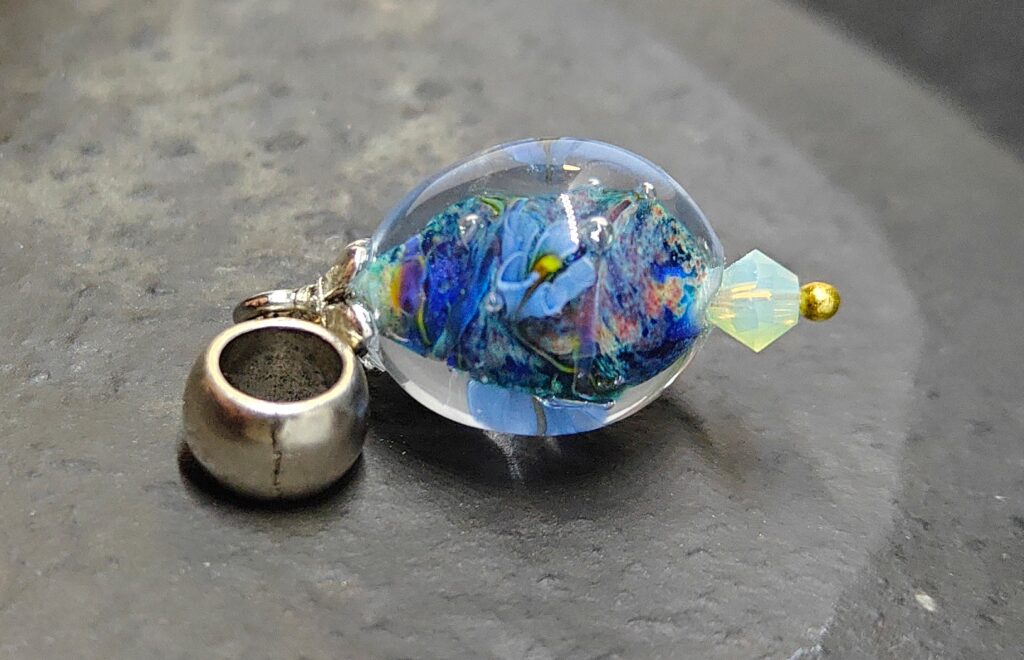 Blue violet pendant with blue bead